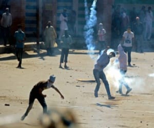 Valley fiery protest, threw stones at security forces