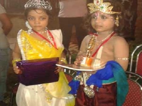 Children dressed as Radha Krishna
