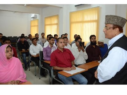 Azam Khan advises students.