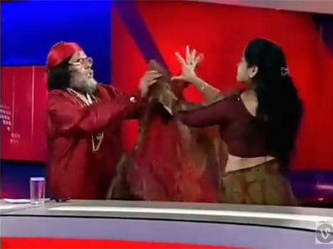 slap in live program of channel