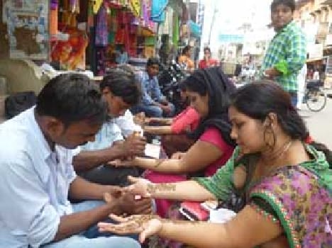 The henna on the palms adorned Teej