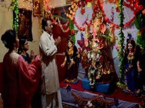 Ganpati Bappa Morya ' each side of the coined Ghosh