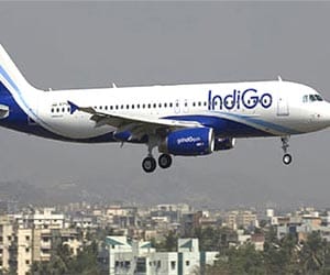 Boeing plane flying from jolly grant airport.