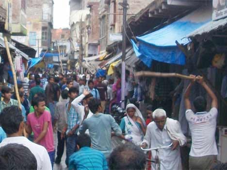 After the murder of the student , villagers put jam on highway