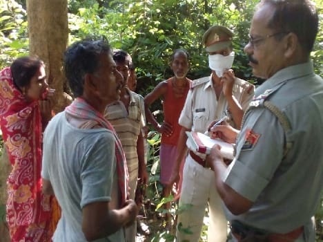 Hanging from trees in forest The young man 's body found