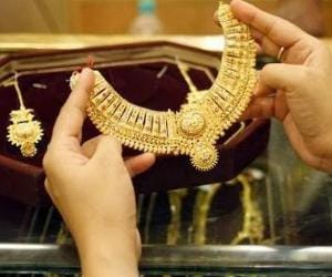 five marks of check gold purity.