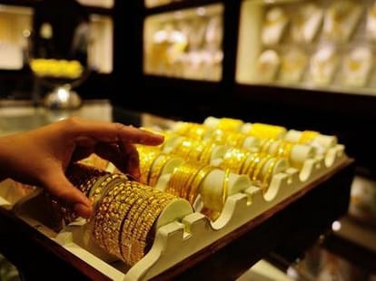 five marks of check gold purity.