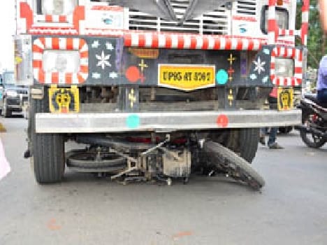 Including the truck rammed into the bike man
