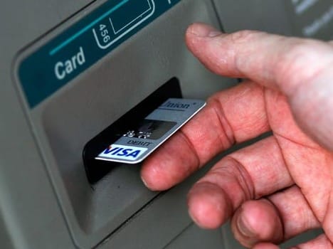 The bank officer asked the woman to the pin and blow money.