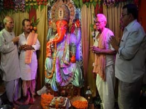 Devotees thronging the eighth day of the Ganesh festival