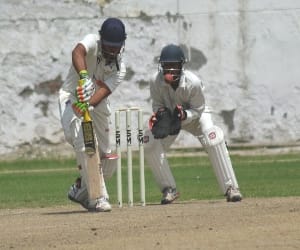 In a practice cricket match players shed sweat.