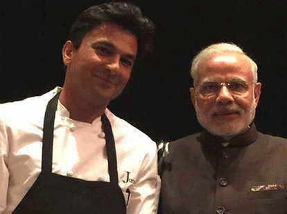 Modi signs on painting for Chef Vikas Khanna, controversy erupts