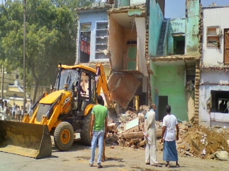 To four-lane the stumbling blocks were demolished houses