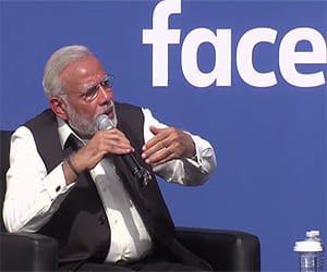 BJP and Congress hit on PM emotional - Modi US Trip 2015