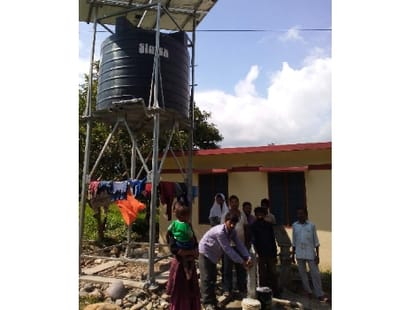 public brings drinking water for village.