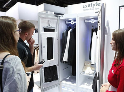 The £1500 closet that can dry clean your clothes: LG reveals new hi-tech laundry machine