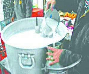 Take in the city's posh colonies 'Milk ATM'