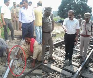 A train runs over a damaged track.