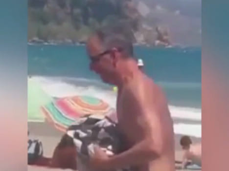 holiday makers filmed in outrageous solo sex act as children play nearby 