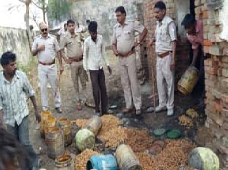 Excise on alcohol compound raid , four arrested