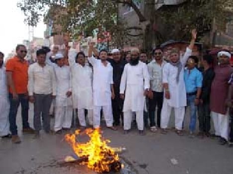 Azam supporters burnt effigies of 
