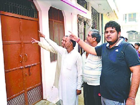 Tantric action on the gate of the house resembled panic