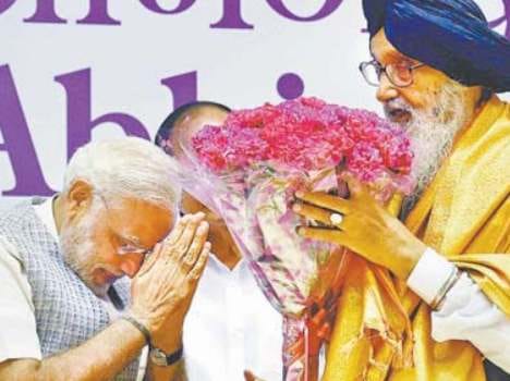 narendra modi compared parkash singh badal to nelson mandela
