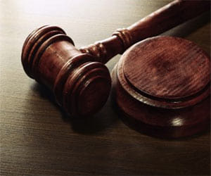 case filed against NHM employees.