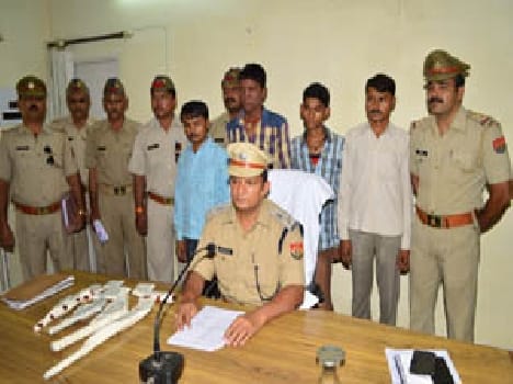 four arrested about robery plan in doctor's home