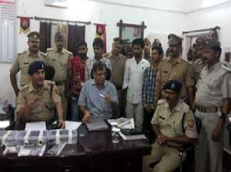 Four arrested in murder of journalist