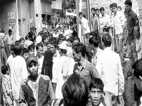 During the election the two sides clash , stones
