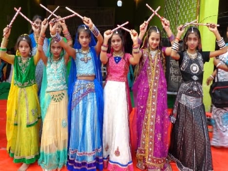 Dandiya fiercely twirled women