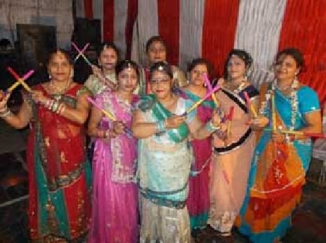 Dandiya fiercely twirled women