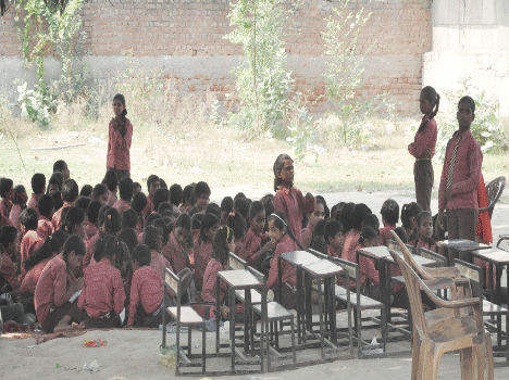 Classes took under the trees by teachers.