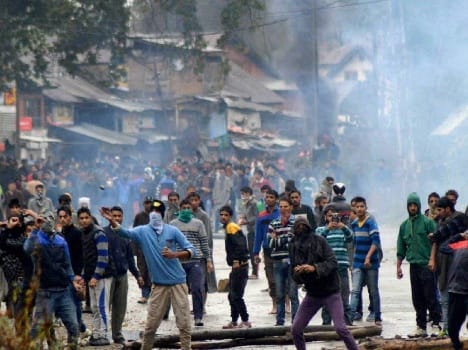 clashes continue in kashmir between police and protesters
