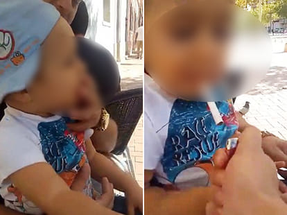 men made a child drink beer and smoke ciggerete