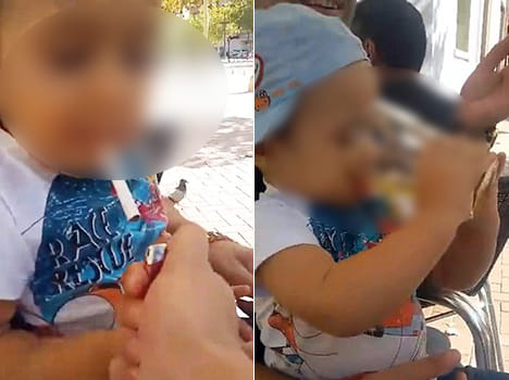 men made a child drink beer and smoke ciggerete