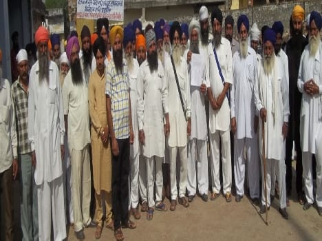 Sikhs silent march out