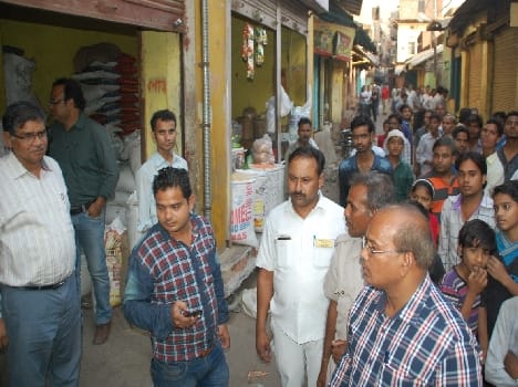 Raids on hoarders pulses, traders resist