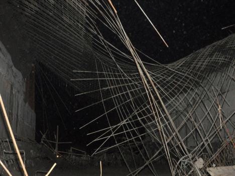 under construction over bridge fell down, four workers injured.