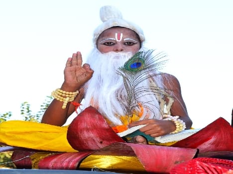 God came down in the flower procession of Valmiki