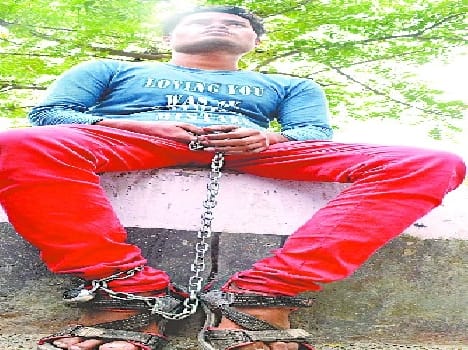 Shackled by chains at the factory were forced to work