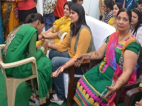 Diwali Mela dandiya heavily on women twirled
