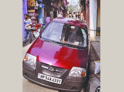 boy crushed two people under car.