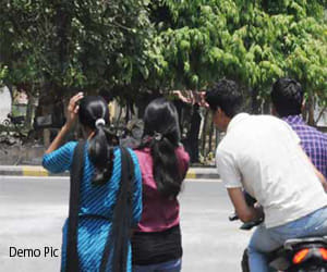 Bikers pulled the young girl's scarf.  