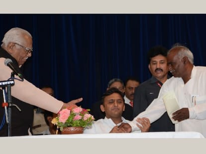 New ministers take blessings of Mulayam Singh Yadav.