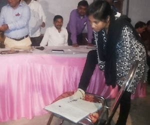 pushpa singh signs with leg after wining election