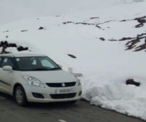 Rain, snow in the valley rolled mercury