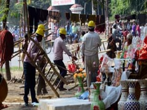 Road remains on track, shops , garages demolished