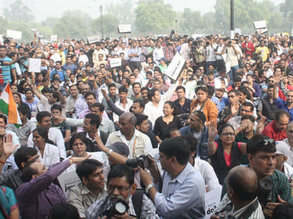 Female journalist heckled in Anupam Kher's March.